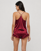 Conjunto em cetim com costas cruzadas e calções com folhos