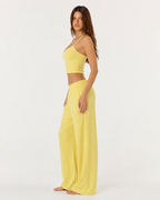 Conjunto em malha com camisola curta e calças largas