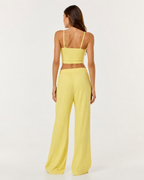 Conjunto em malha com camisola curta e calças largas