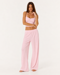 Conjunto em malha com camisola curta e calças largas