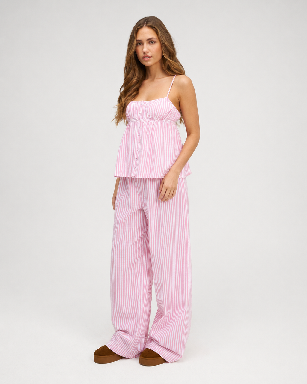 Conjunto às riscas com camisola fluida e calças largas