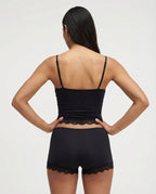 Conjunto suave de camisola e calções com renda ondulada
