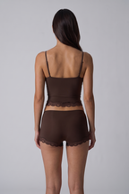 Conjunto suave de camisola e calções com renda ondulada